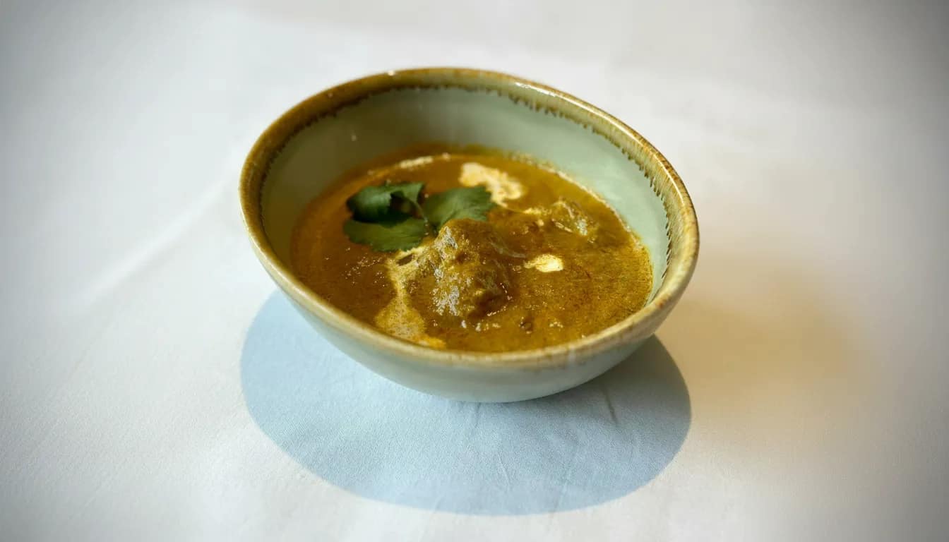 Himali lamb curry with peppers, coriander, and roasted spices.