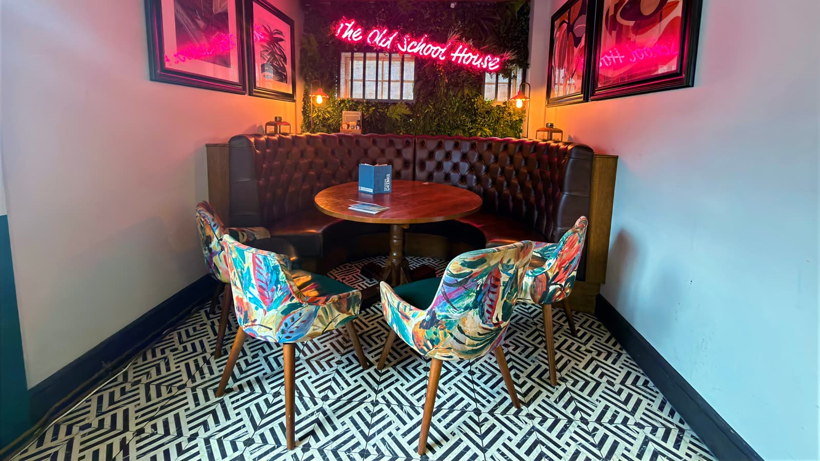 Alternate indoor seating area at The Old School House arranged for relaxed pub dining.