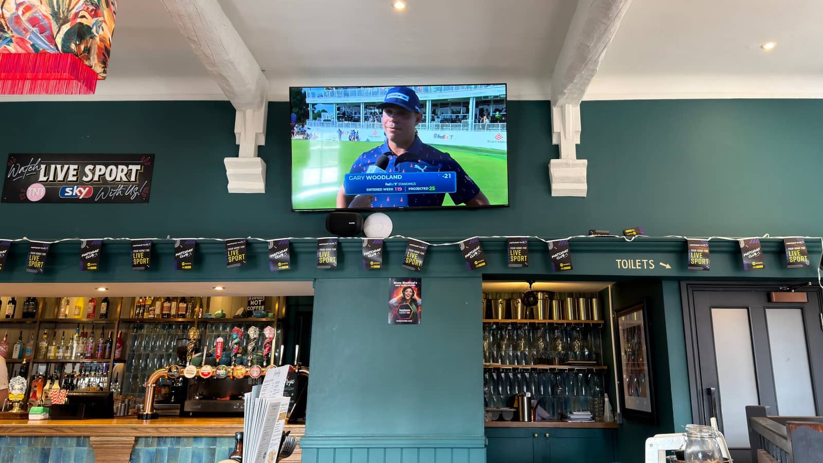 Large sports screen set up inside The Old School House for match nights.