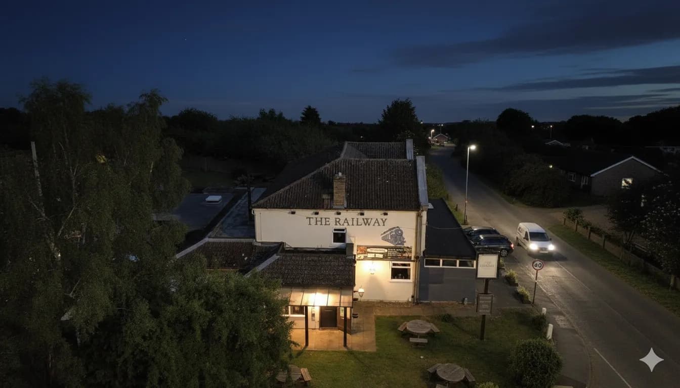 The Railway Whittlesey exterior at night opposite the station.